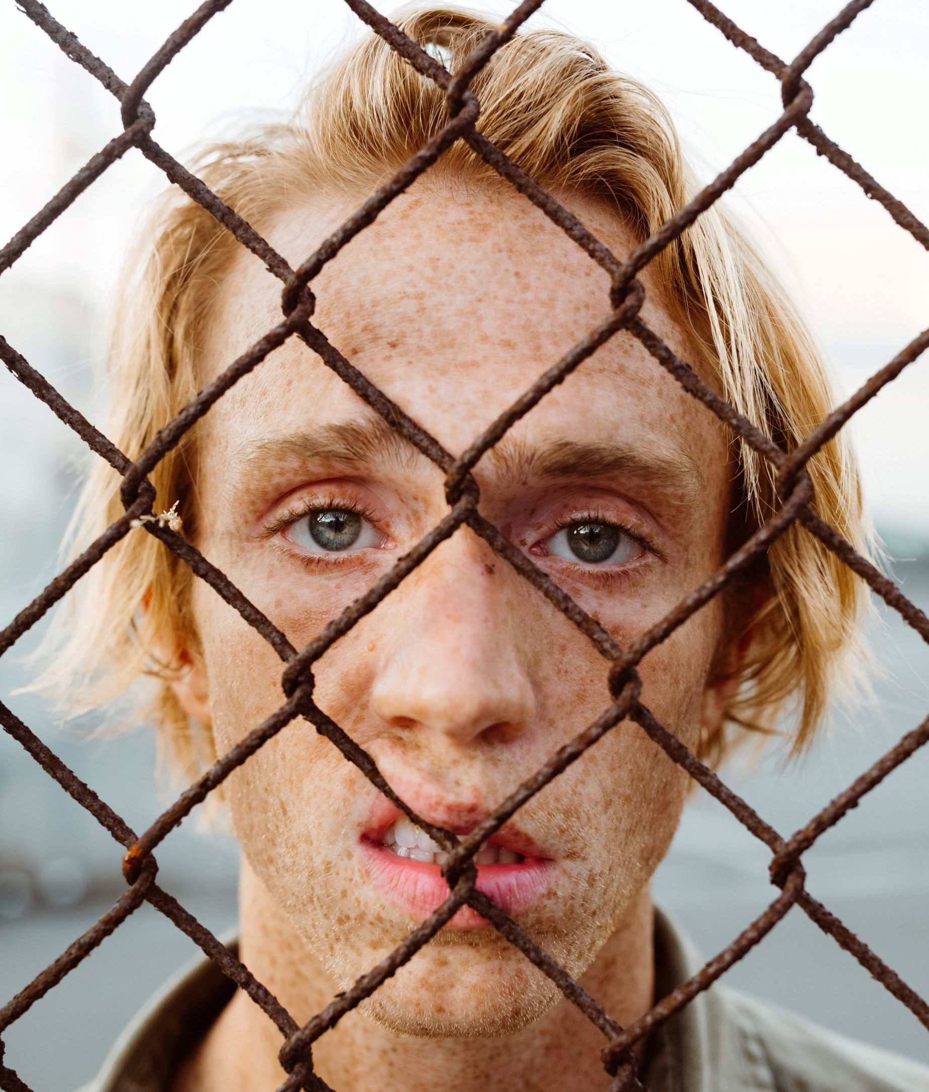 Nathan Dumlao Unsplash Boy Behind Bars 4MP